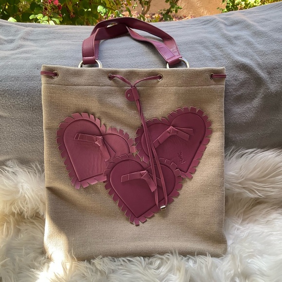 YVES SAINT LAURENT
Leather Heart Embellished Canvas Tote Bag - Picture 2 of 12